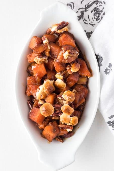 Molasses Glazed potatoes with pecans and marshmallows.