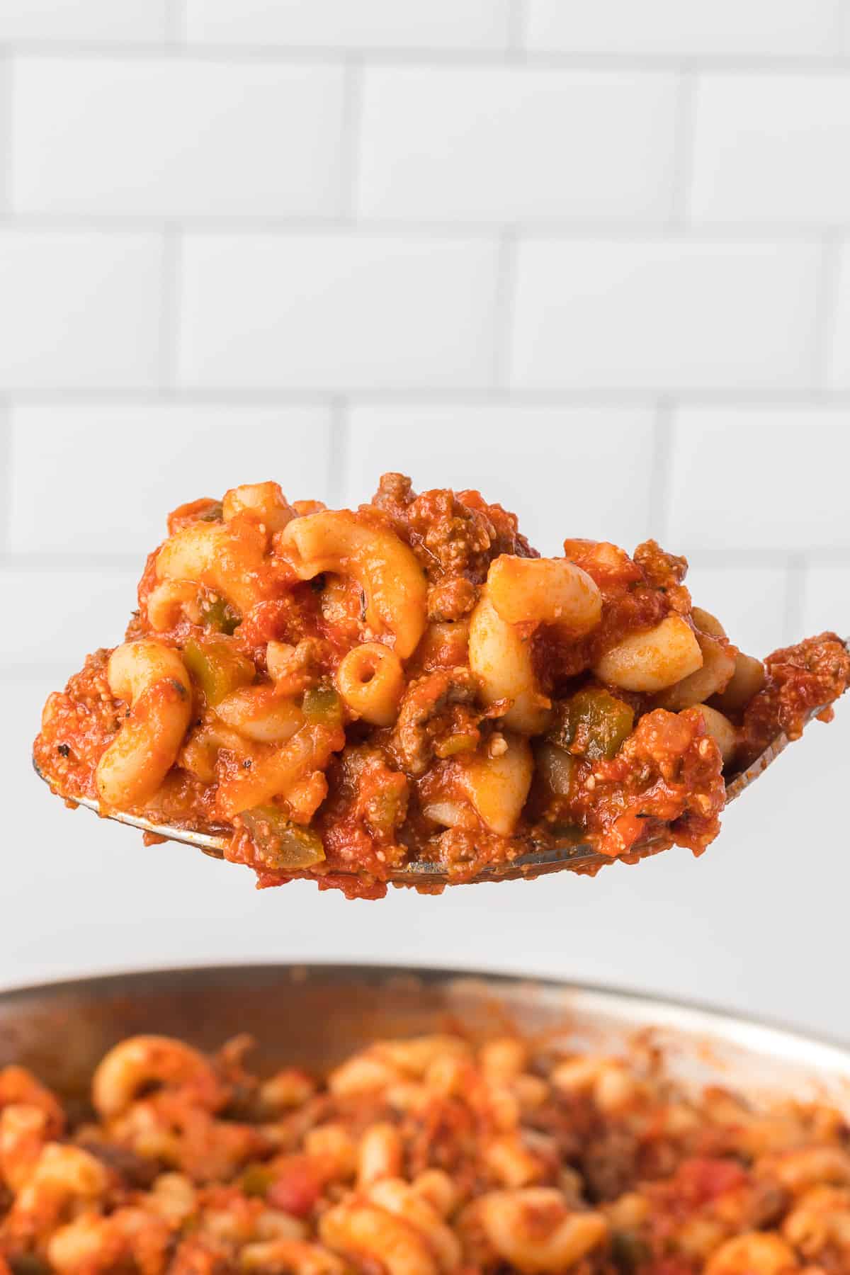 American Goulash on a serving spoon.