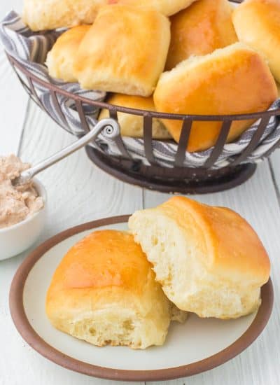 Copycat restaurant soft and fluffy dinner rolls with cinnamon honey butter.