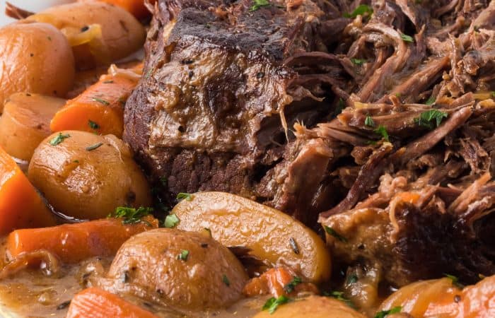 Slow Cooker carrots, potatoes, and pot roast.