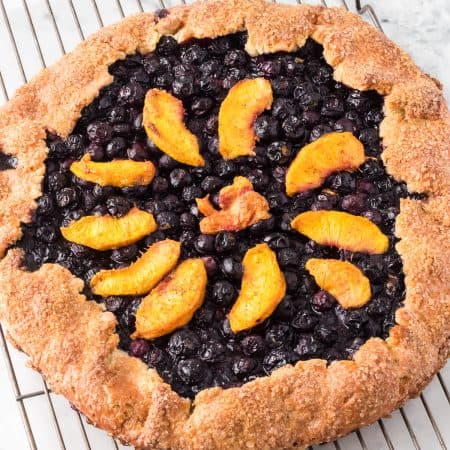 A galette made with peaches and blueberries.