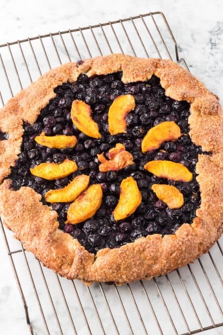 A galette made with peaches and blueberries.