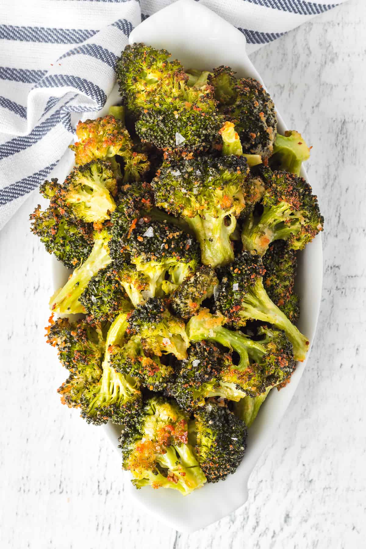 Broccoli roasted with cheese and garlic powder.