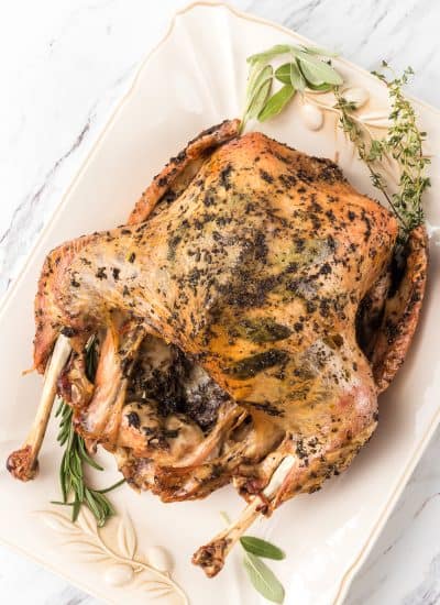 Sage, rosemary and thyme help make this Roasted Turkey extra delicious.