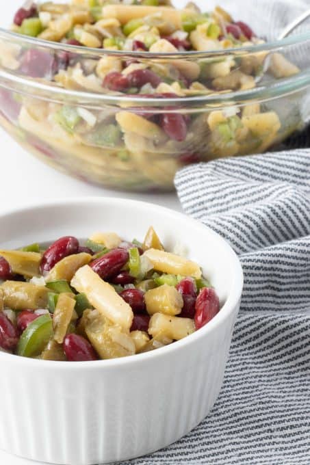 An easy summertime salad with beans, green pepper and onion