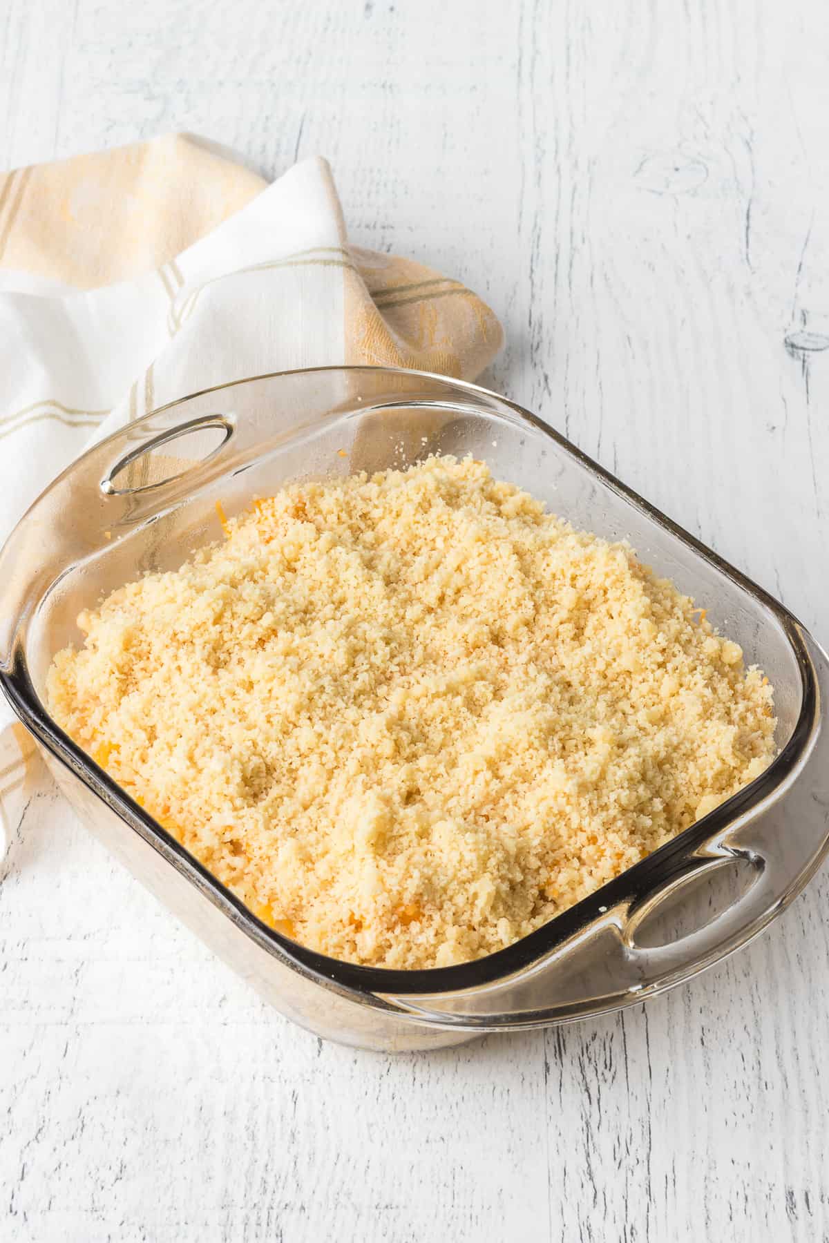 Cheesy Macaroni covered with buttered bread crumbs.