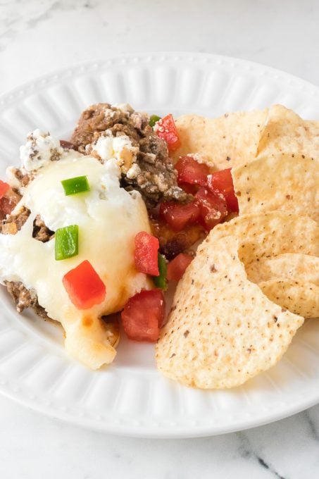 Tortilla chips for a taco seasoned appetizer dip.