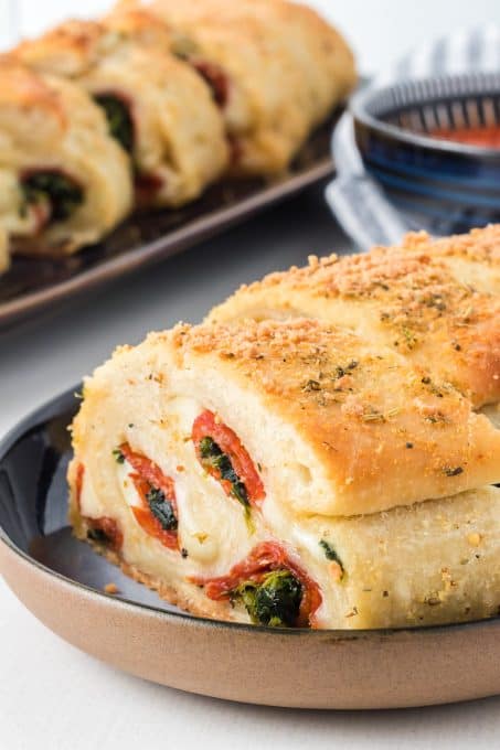 Spinach bread with pepperoni and cheese.