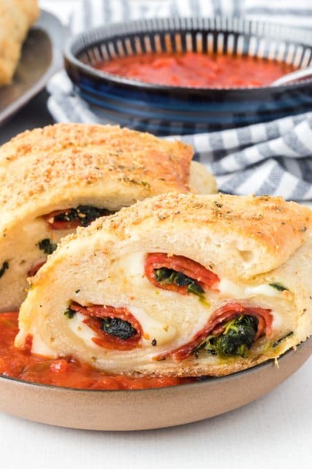 Spinach bread with pepperoni and cheese.