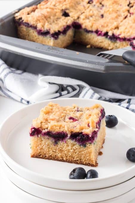 A crumb cake with fresh blueberries.