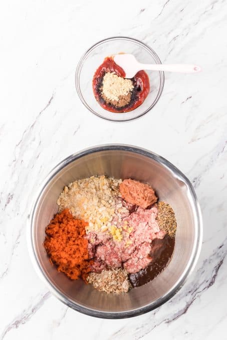 Mixing a meatloaf ingredients together. 