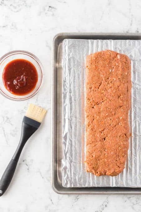 Getting ready to glaze a meatloaf.