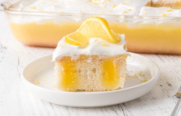 Lemon Poke Cake with Marshmallow Frosting.