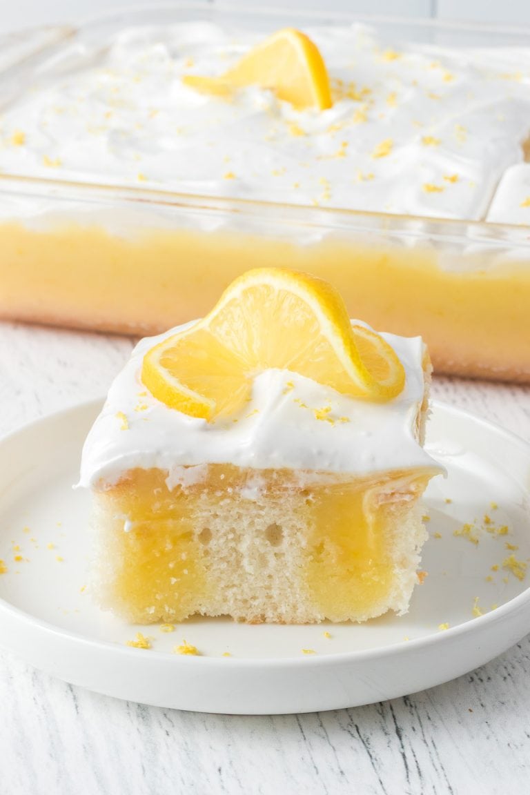 Lemon Poke Cake with Marshmallow Frosting | 365 Days of Baking