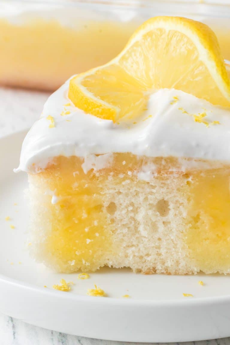 Lemon Poke Cake with Marshmallow Frosting | 365 Days of Baking