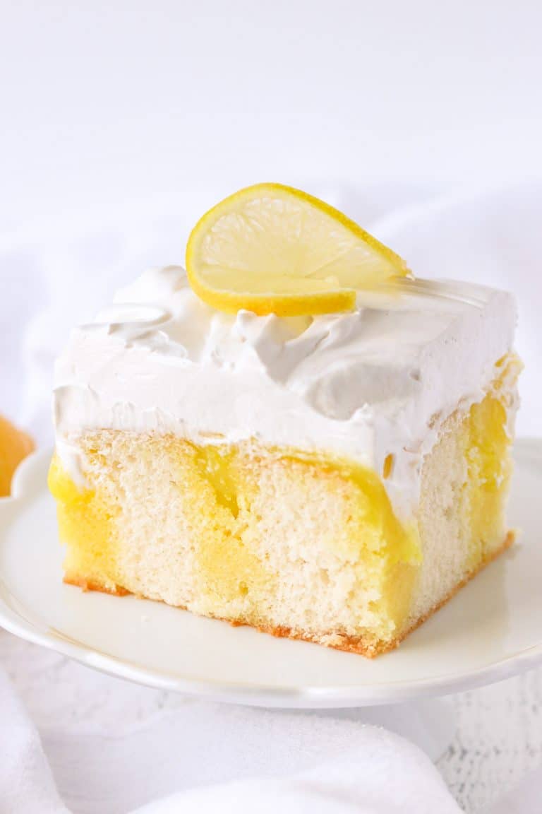 Lemon Poke Cake with Marshmallow Frosting | 365 Days of Baking