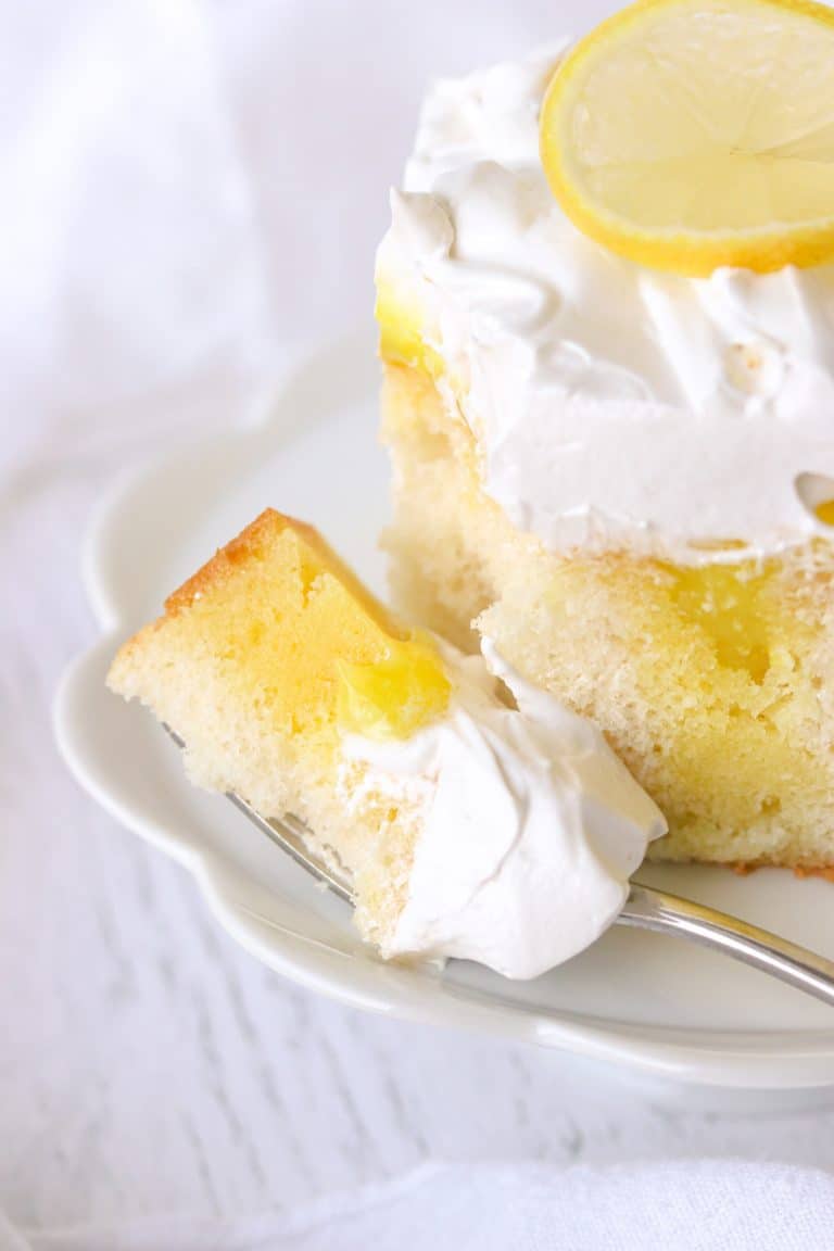 Lemon Poke Cake with Marshmallow Frosting | 365 Days of Baking