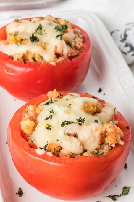 Tomatoes baked and stuffed with cheese and bread crumbs.