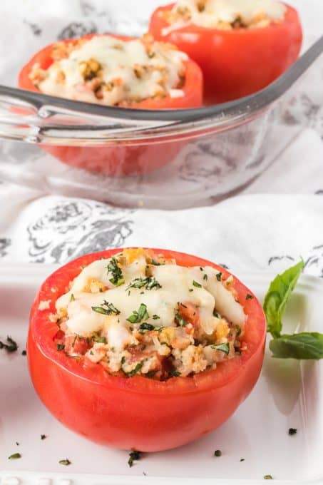 Bread crumb and cheese stuffing in tomatoes.
