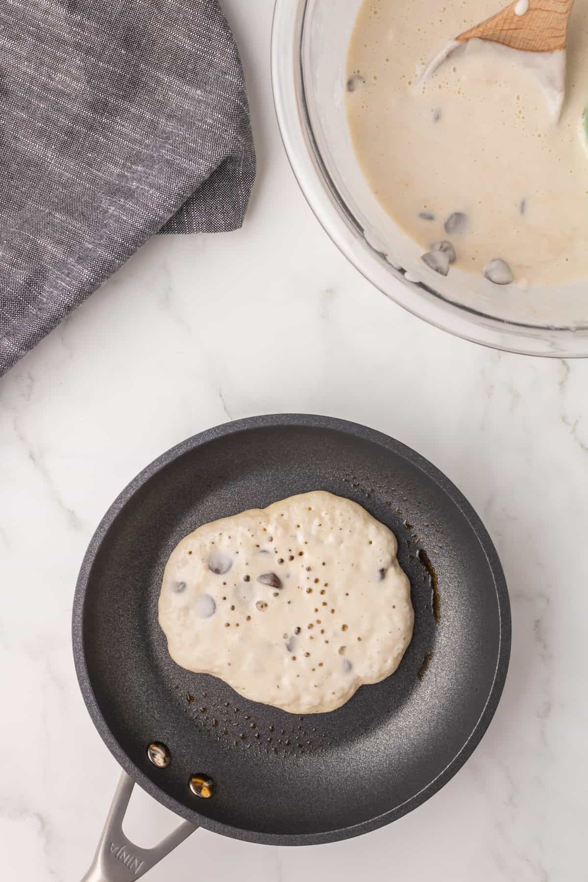 Cooking a pancake.