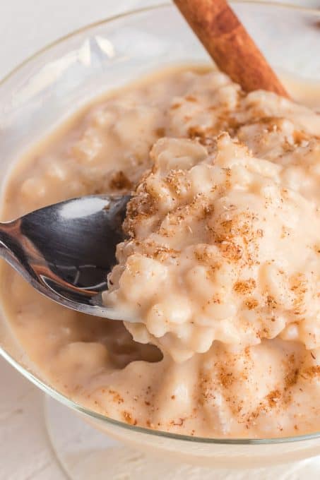 A spoonful of creamy Rice Pudding.