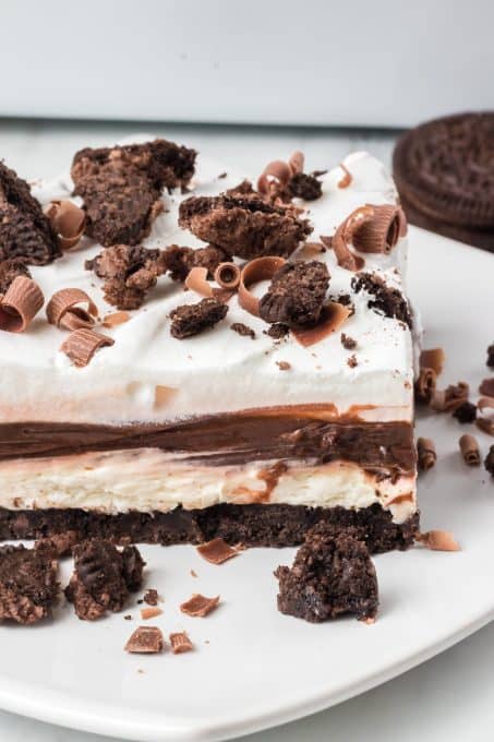 A slice of a no bake chocolate layered dessert.