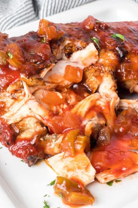 Chicken grilled with BBQ sauce.