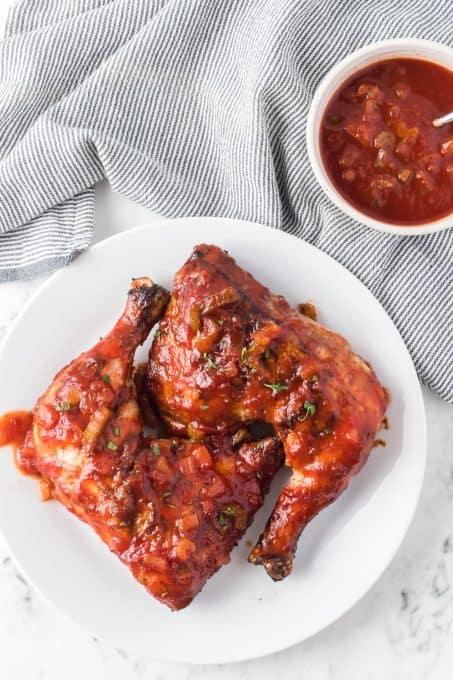 Grilled chicken quarters with a homemade barbecue sauce.