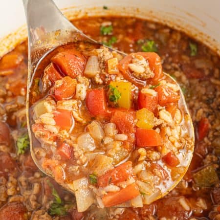 A ladleful of bell pepper soup.