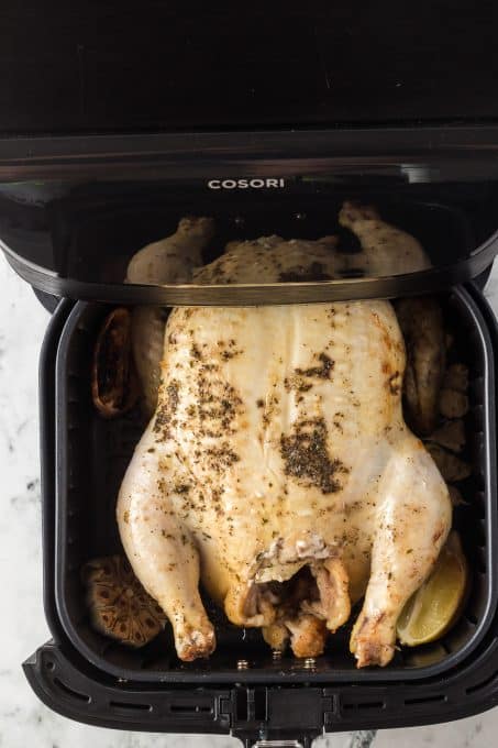 A whole chicken cooked in the air fryer.