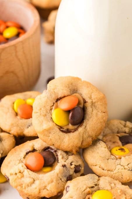 Reese's pieces in cookie cups.