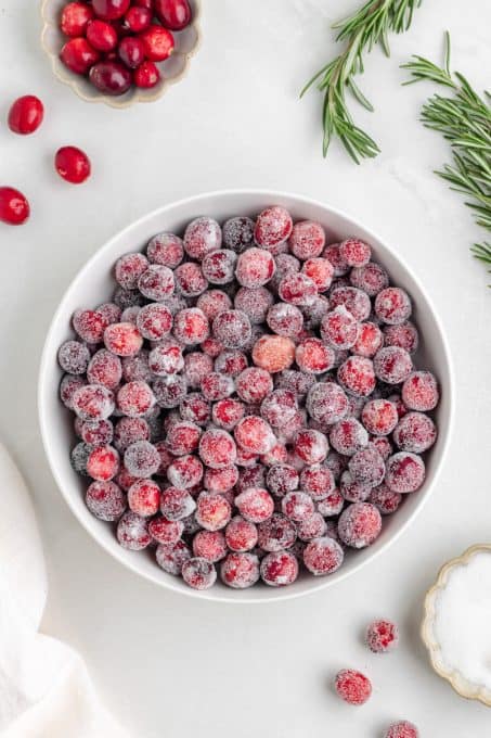 A bowlful of cranberries coated in sugar.