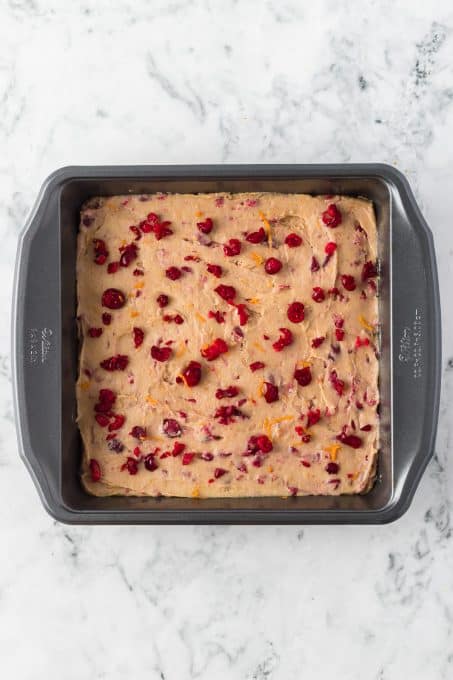 Blondies with crushed cranberries and orange ready for the oven.