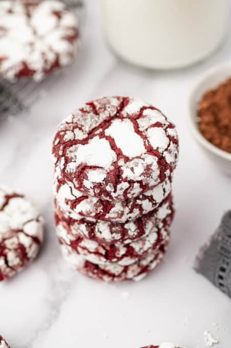 A stack of chocolate velvet crinkles.