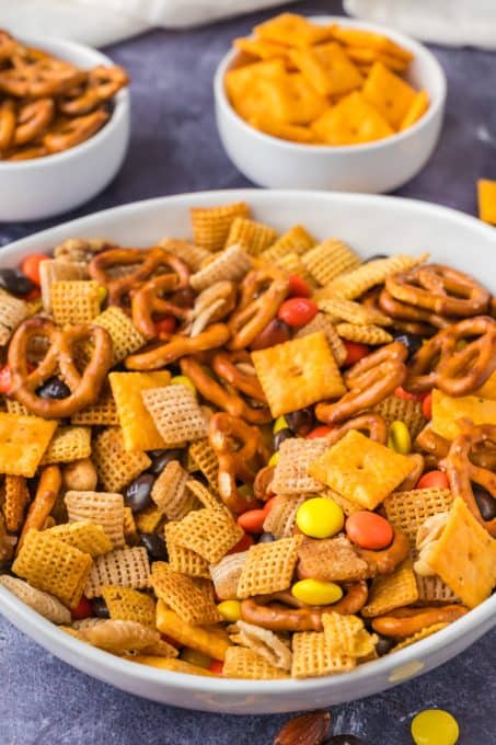 A snack mix made with cereal, crackers, pretzels and candy.