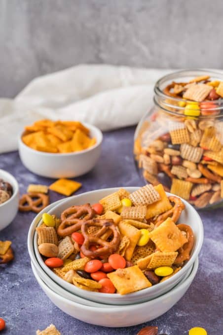 A great snack with cereal, pretzels, candy and crackers mixed together.